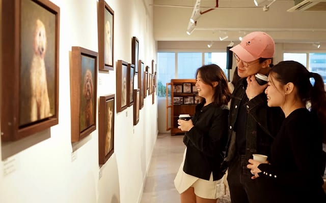 People looking at art